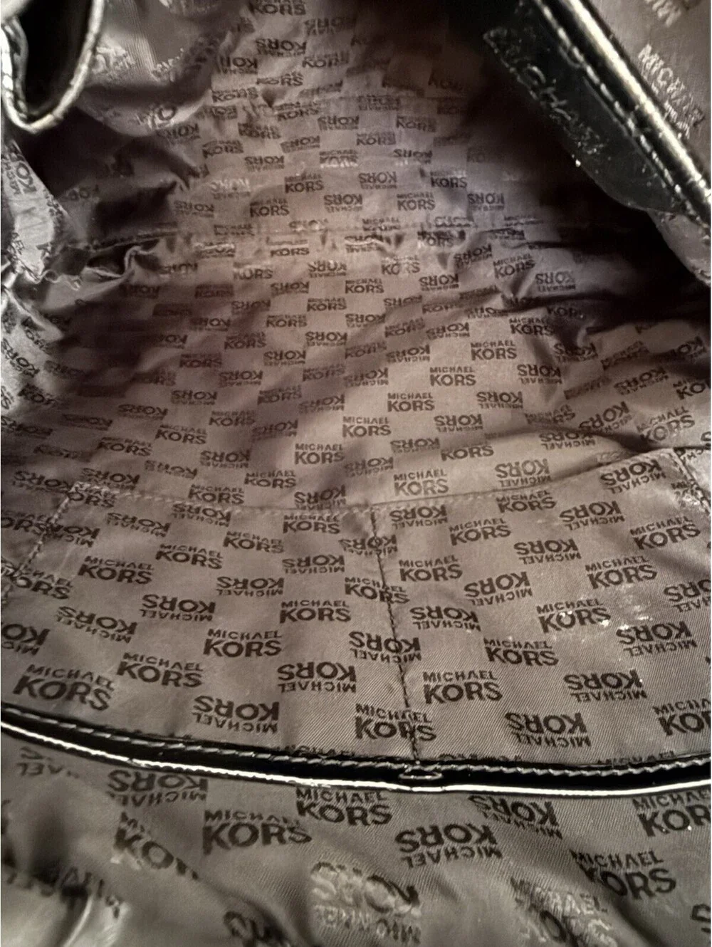 Michael Kors measures 15”